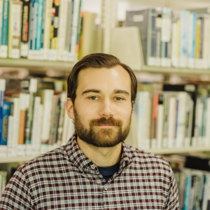 headshot of andrew puente outreach librarian