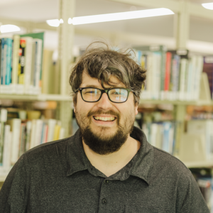 headshot of jordan sprunger genealogy and local history librarian