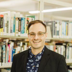 headshot of nicholas eisengruber pr/marketing librarian