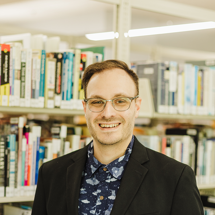 headshot of nicholas eisengruber pr/marketing librarian